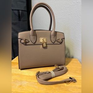 Beige top handle purse